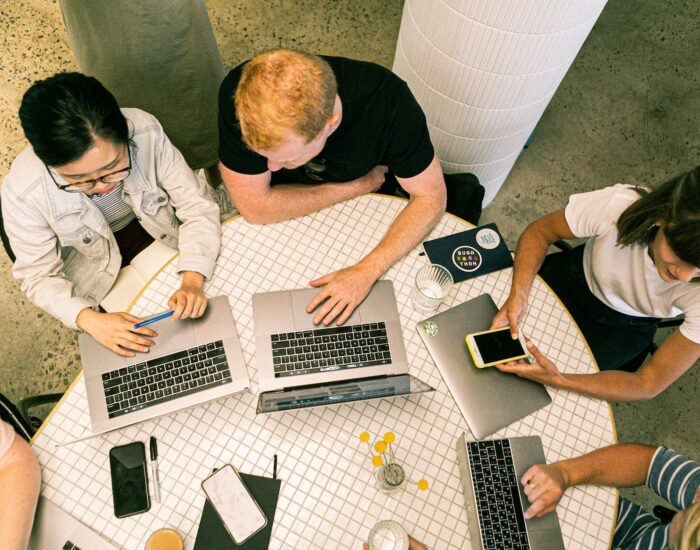 photo of people using laptops