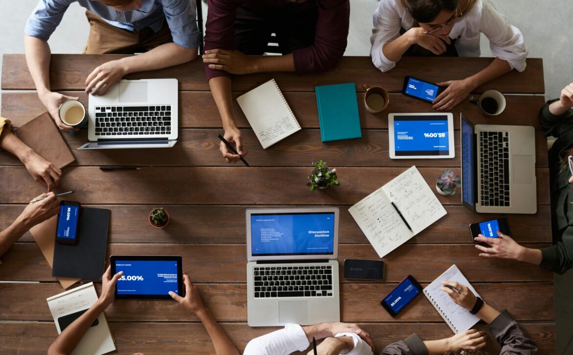 top view photo of people near wooden table