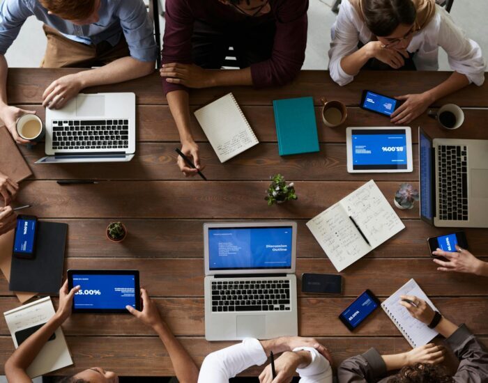 top view photo of people near wooden table